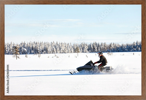 Постер Человек на спортивном снегоходе в финской Лапландии в солнечный день с типом исполнения На холсте в раме в багетной раме 1727.4310
