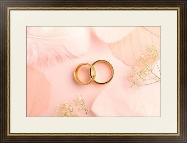 Постер Два золотых кольца на нежно розовом фоне с типом исполнения Под стеклом в багетной раме 1.023.036