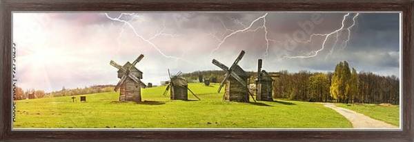 Постер Ветряные мельницы в поле, солнце и гроза с типом исполнения На холсте в раме в багетной раме 221-02